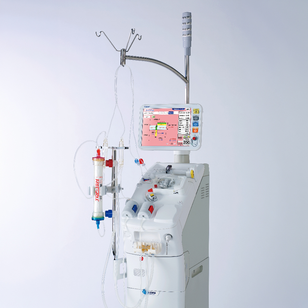 The machine set up for treatment, with blood circuit and dialyzer attached